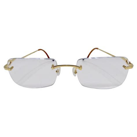 cartier rectangular rimless glasses.